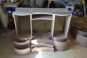 Curved panel cabinet making