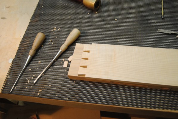 Cutting out waste from between the dovetails
