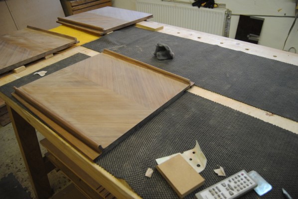 Door panel laid out for sanding