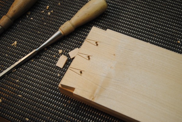 Dovetails marked out and drilled with clearance holes