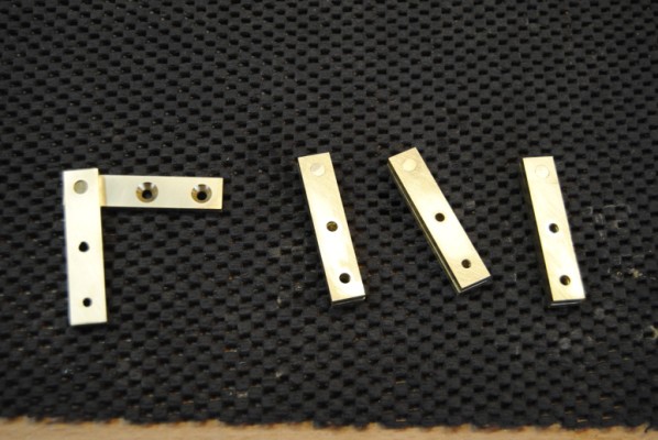 The completed brass pivot hinges