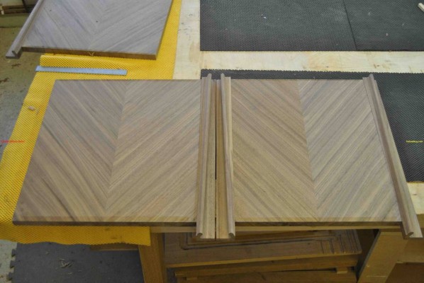 Click to view in LightBox Finished handles glued to door panels ready for trimming