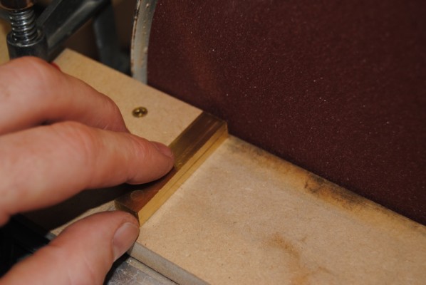 Rough shaping the brass pivot hinges