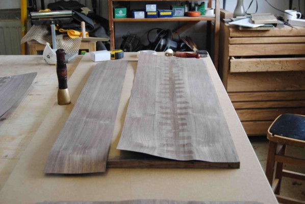 Two veneer leafs taped together