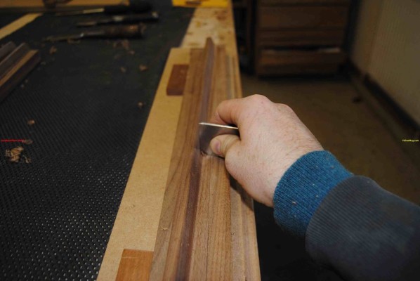 Click to view in LightBox Using custom made scraper to shape the sideboard door handles