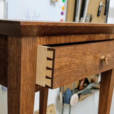 English side table with dovetail drawers.